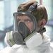 3M 6000 Series Full Face Respirator Mask Being Worn by a Man Thumbnail