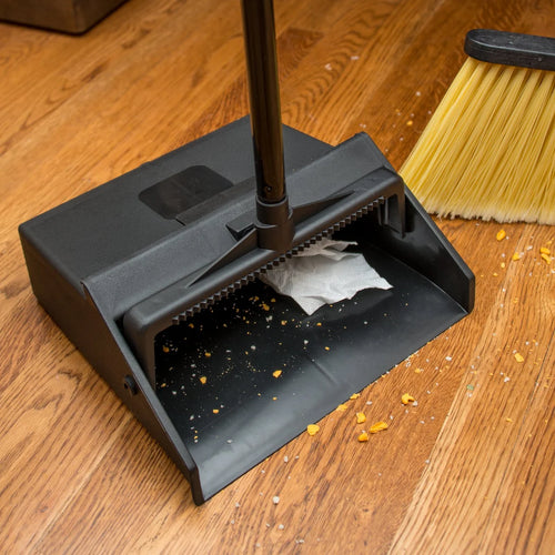 Sweeping Up Debris with the Carlisle Black Lobby Dustpan Thumbnail