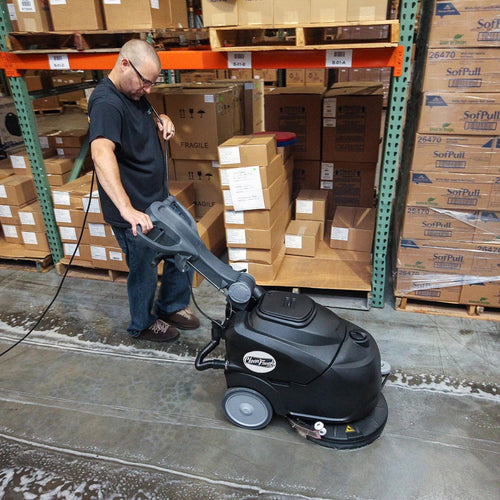 CleanFreak® 18" Reliable 18E Electric Auto Scrubber in Use in Warehouse Thumbnail