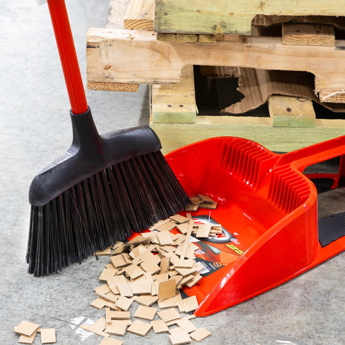 Libman #994 Commercial Angle Broom Sweeping up Cardboard in a Warehouse Thumbnail