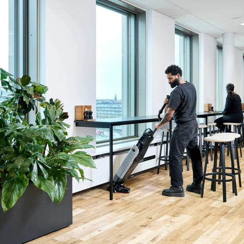 Cleaning a small spill in a cafeteria with the Nilfisk Dryft Li-ion Micro Floor Scrubber Thumbnail