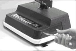 The side can be slid forward after a single screw is removed. The side can be slid forward after a single screw is removed.