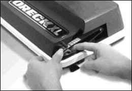 Using a rolling motion over the brush roll will help get the belt in place. Using a rolling motion over the brush roll will help get the belt in place.