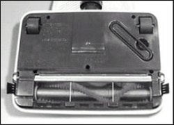 Reassemble the belt and the base plate and check bristle height above base plate at each end of brush. Reassemble the belt and the base plate and check bristle height above base plate at each end of brush.