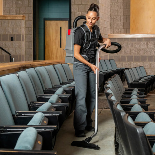 Cleaning an Auditorium with the Sanitaire Transport Cord Electric Backpack Vacuum Thumbnail