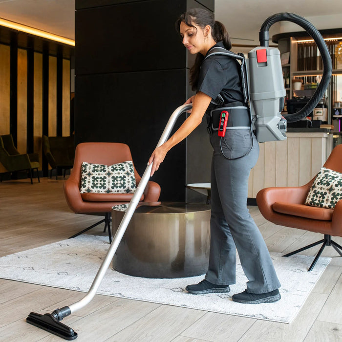 Sanitaire® Transport® Cordless Backpack Vacuum In Use