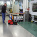 Bissell® 31 inch Battery Powered Push Sweeper In Action