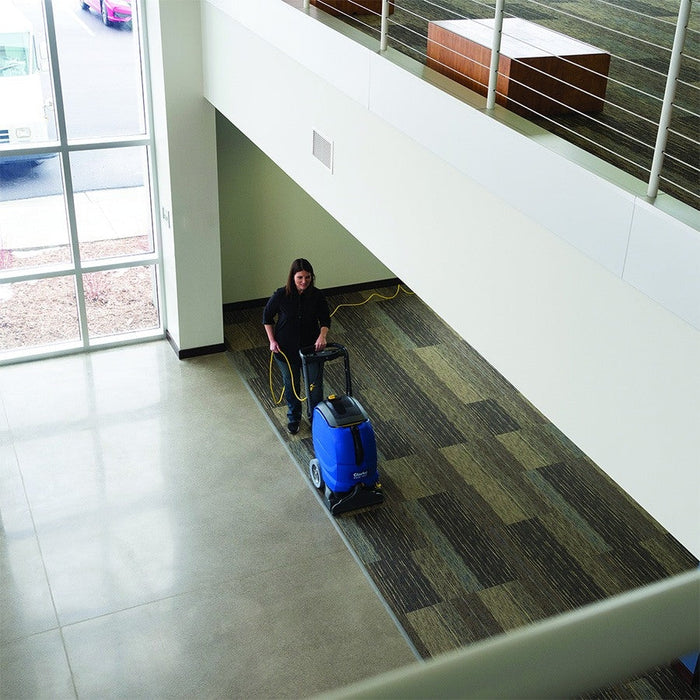 Clarke® EX40™ 16ST Self-Contained Extractor Scrubbing a Large Area of Carpeting