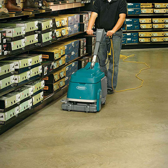 Tennant® T1 Cord Electric 15” Walk Behind Micro Scrubber on Concrete